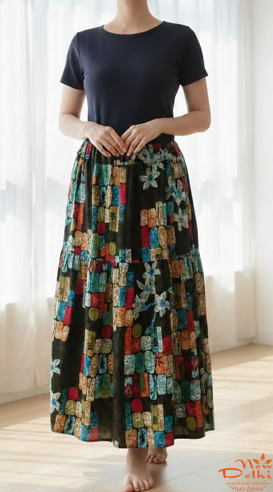 Спідниця штапель, довга.Темно-зелена з квітами.